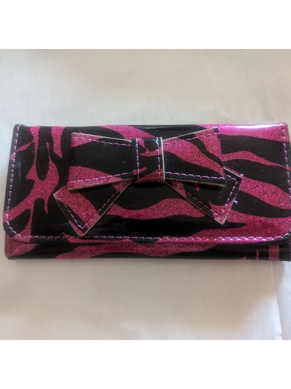Pink and black Tiger Print Bow Wallet- Claire's Boutique